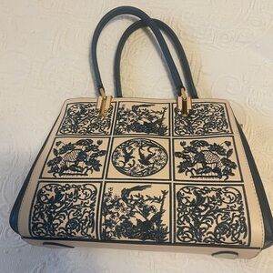 Beautiful foreign made, navy and off-white handbag